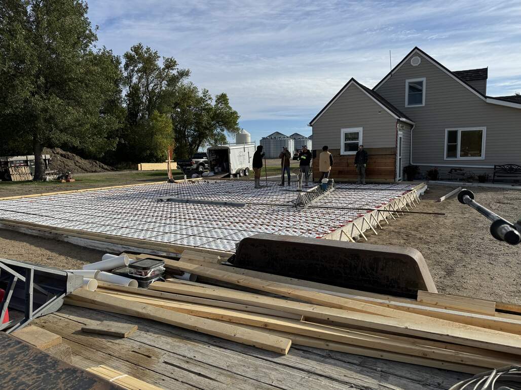 Concrete foundation with rebar reinforcement being poured in Jamestown, ND