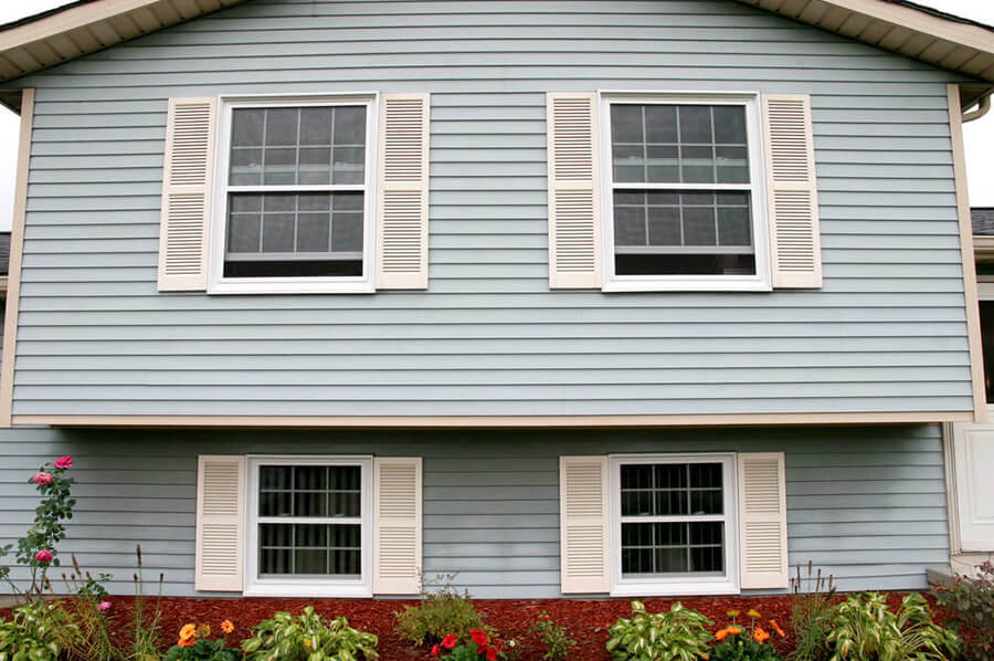 Gray lap siding with chimney on a Steele, North Dakota home