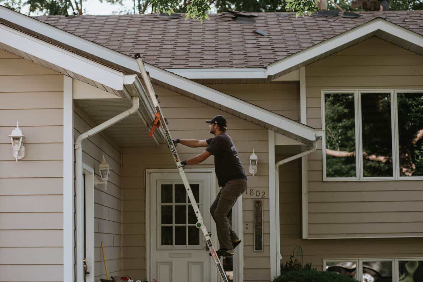 Vetter Construction LLC Man Climbing Ladder